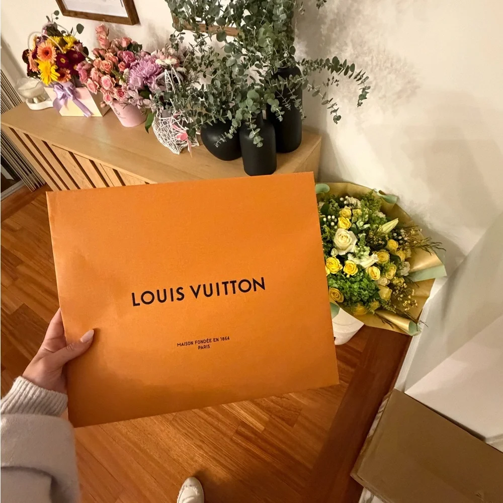 Louis Vuitton Orange Branded Shopping Bag with Black Logo